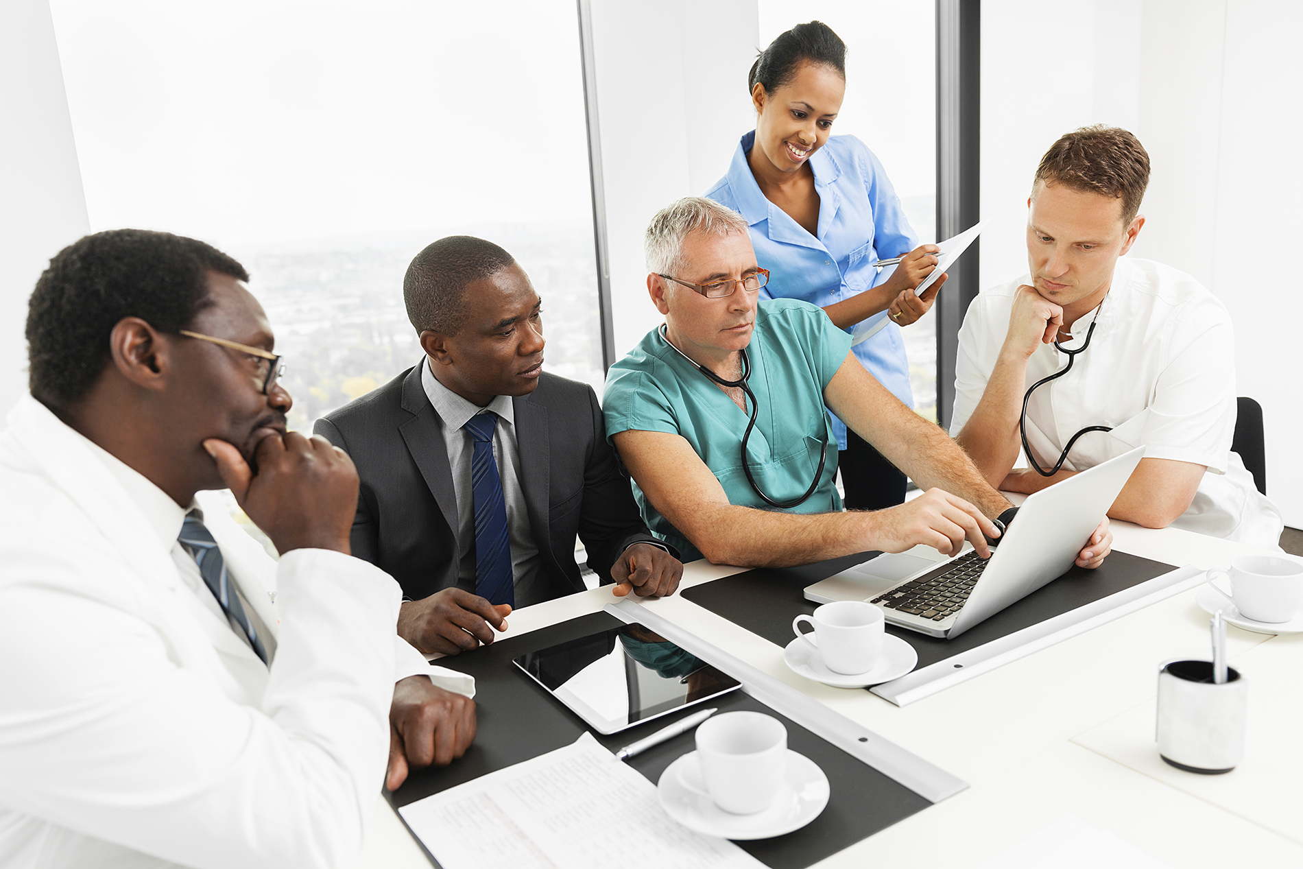medical staff reviewing facility info